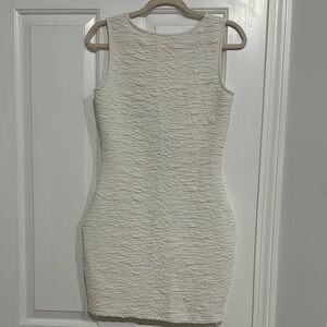 Elegant White Textured Sleeveless Dress